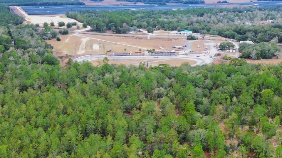 Aerial overview of land and roadway in North Central Florida